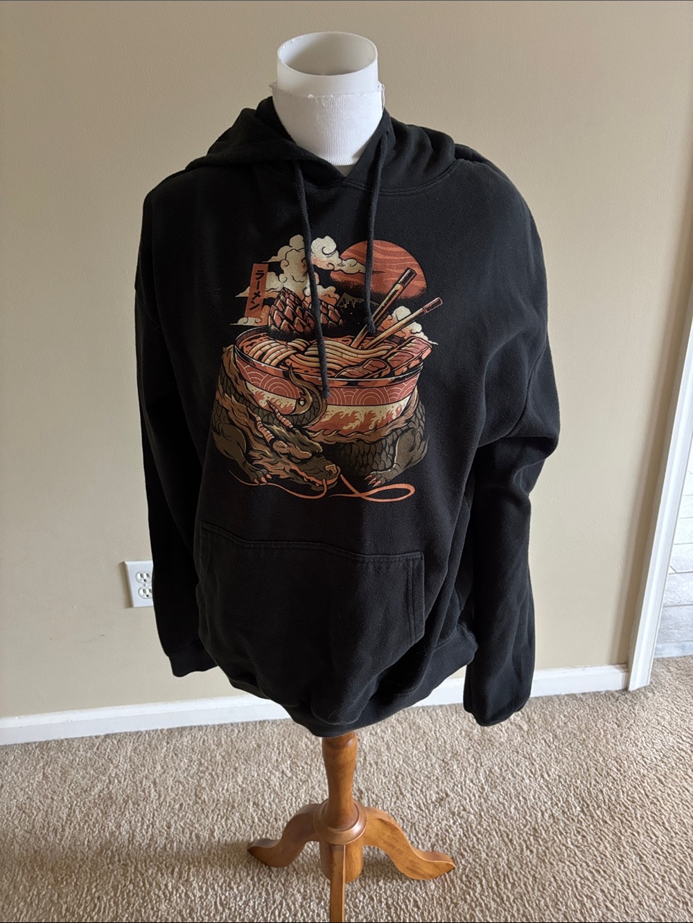Black Hoodie with Orange and Cream Ramen Graphic
